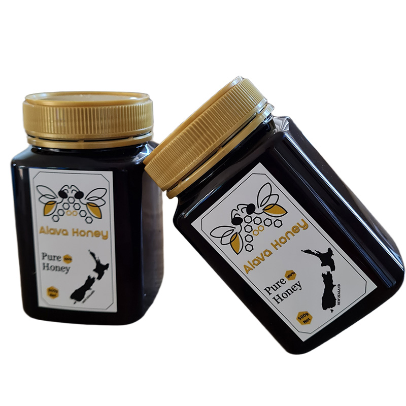 Two jars of Alava Honey Pure Honey containers angled